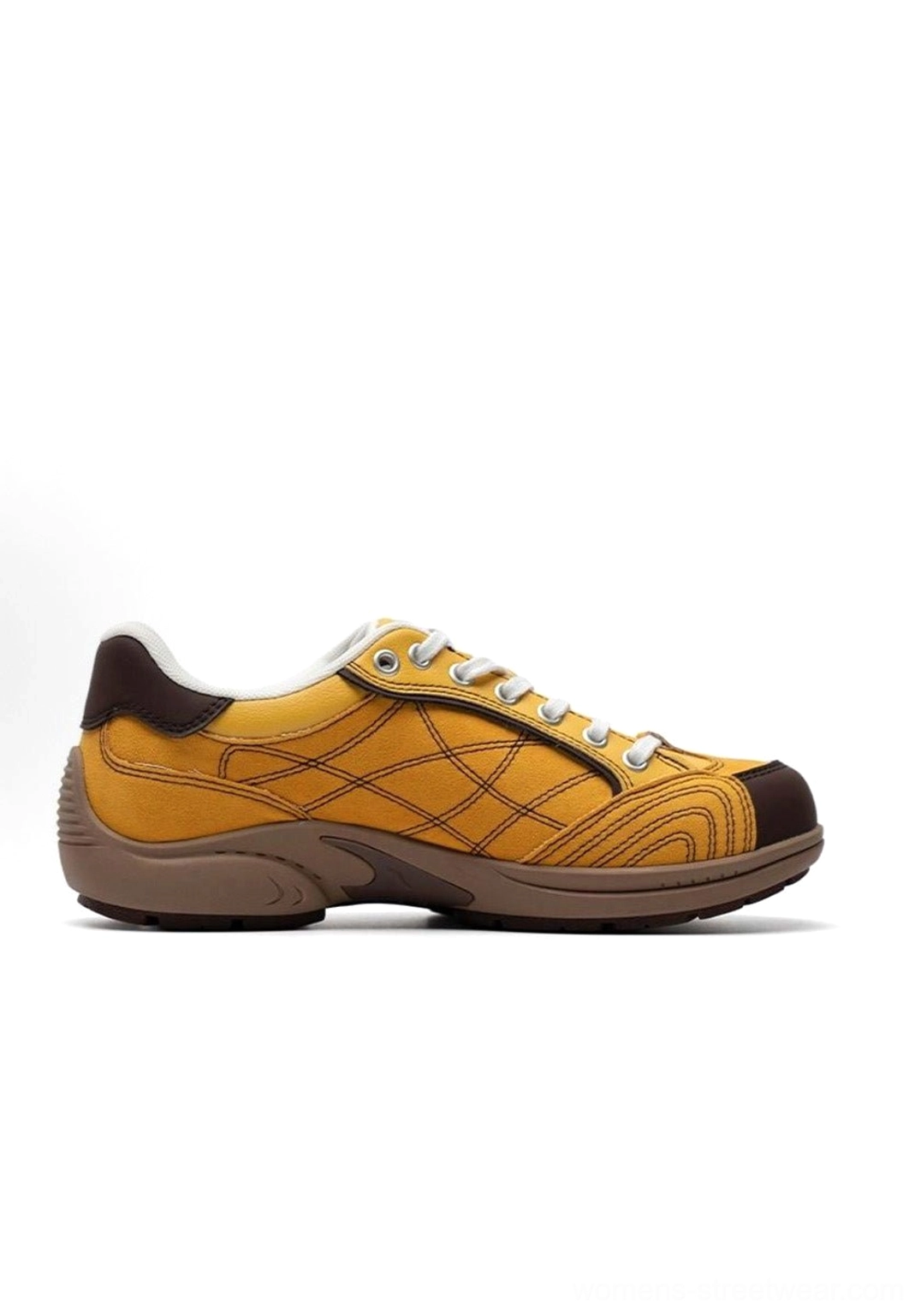 Right side profile product display of retro colorblock German trainer showing detailed stitched grid pattern, heel branding tag and thick rubber outsole