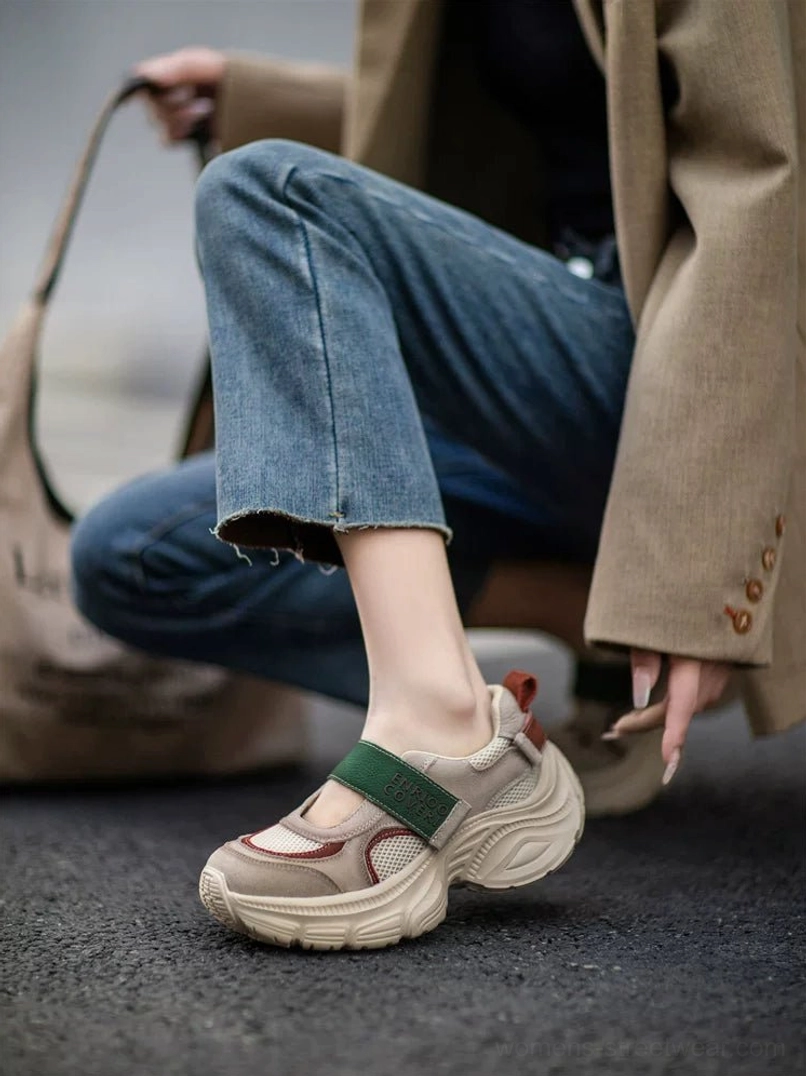 Khaki retro Mary Jane platform sneakers with green hook and loop strap, breathable mesh panels, layered color accents, and chunky rubber sole styled with cropped jeans and brown blazer