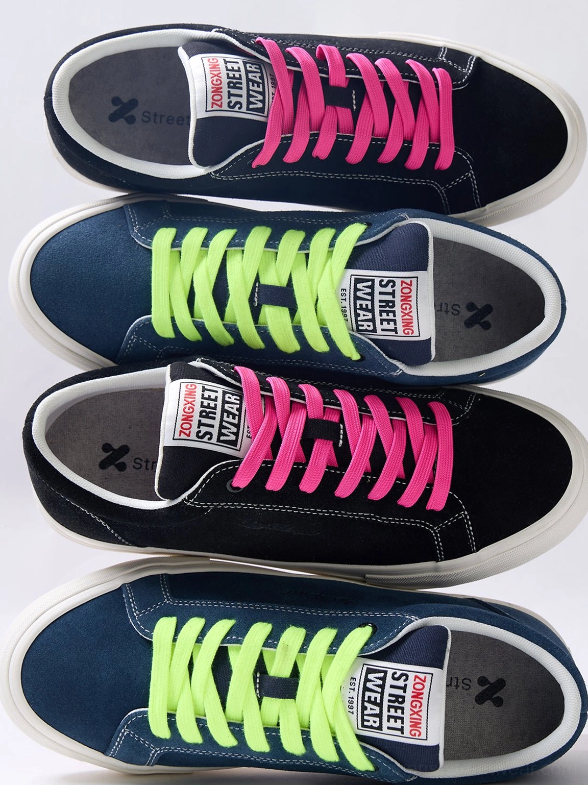 Retro-inspired neon lace platform canvas sneakers with contrast suede panels, rounded toe construction, and white rubber outsole