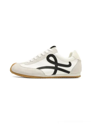Retro panel gum sole streetwear sneakers in light grey and white with contrasting black side detail shown from above on a white background