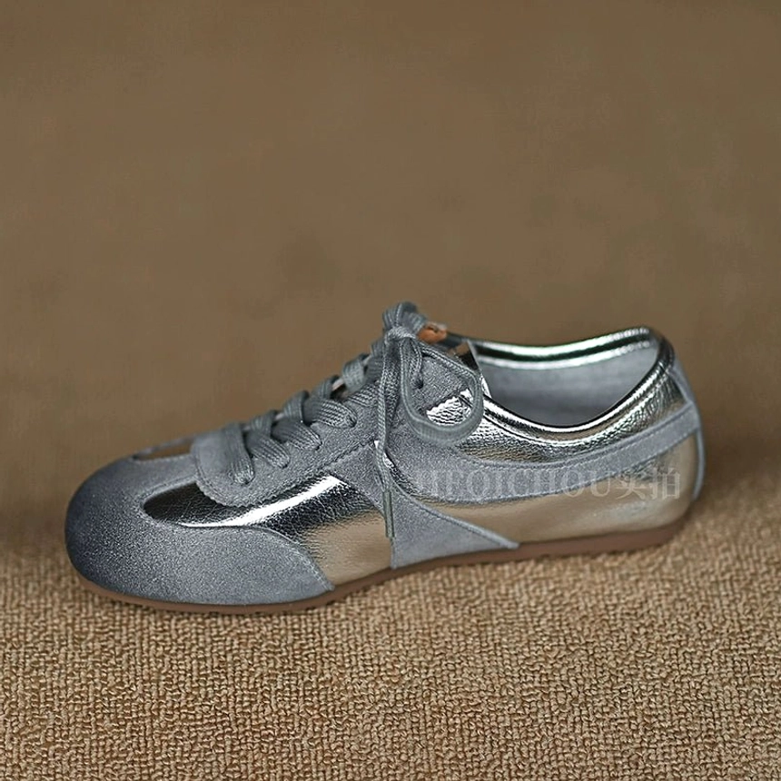Retro Silver leather and suede streetwear sneakers with two-tone panels, classic lace-up front, low-profile sole, and vintage-inspired silhouette