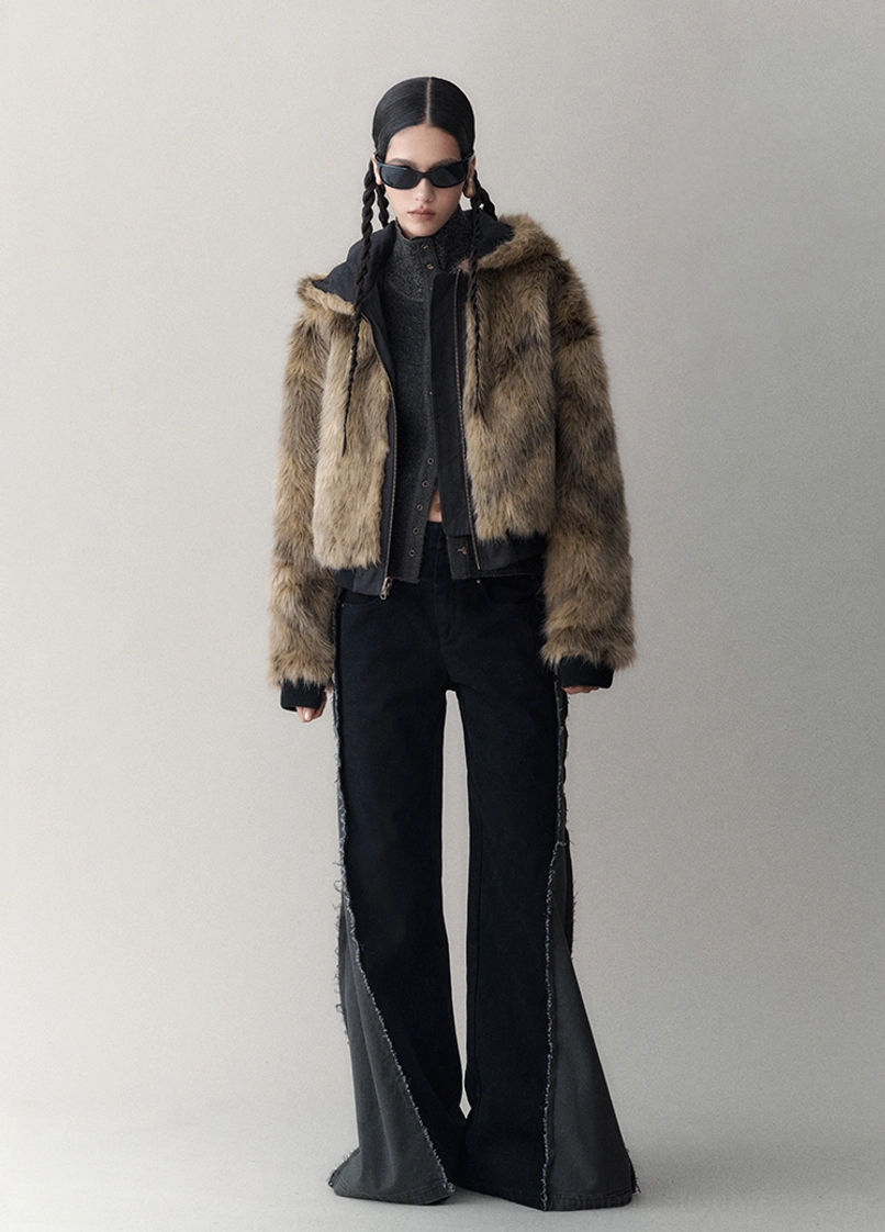 Reversible hooded faux fur winter jacket product image showing the oversized cropped streetwear silhouette and two-way styling concept