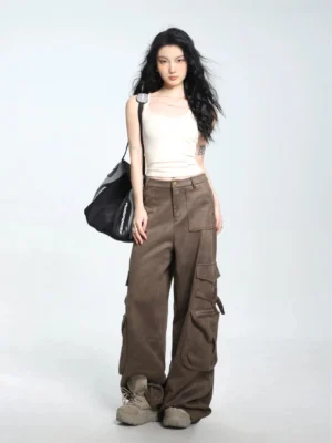 Off white ribbed square neck spaghetti strap cropped camisole styled with brown cargo pants and work boots