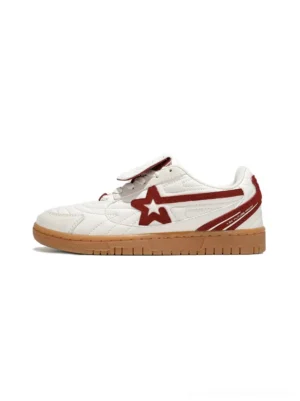 Rice red star panel retro trainers side view with rice white upper, deep red suede star detail, foldable tongue and gum rubber sole