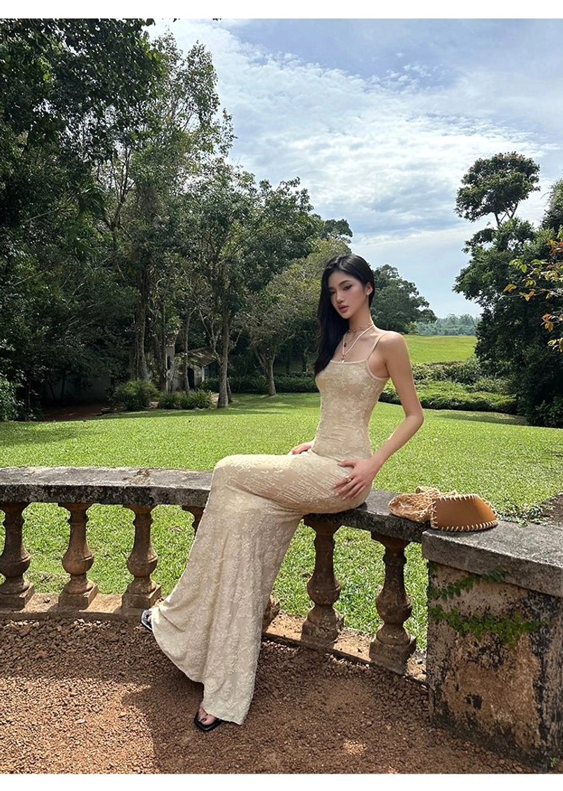 Romantic beige floral lace maxi dress with bodycon fit fishtail hem and minimal spaghetti strap styling