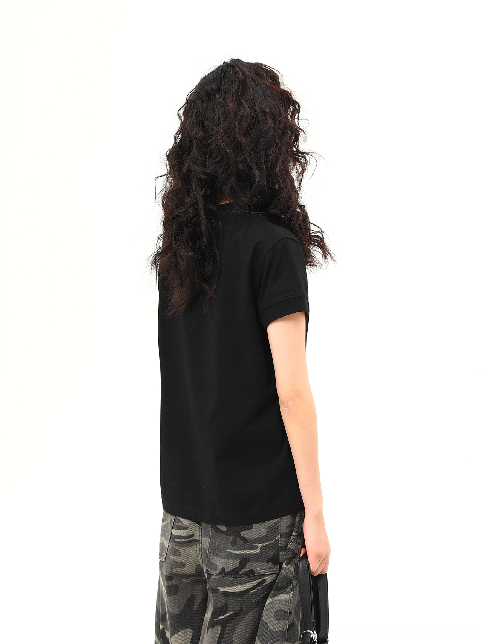 Back view of black short-sleeve romantic graphic streetwear T-shirt with plain solid-color reverse