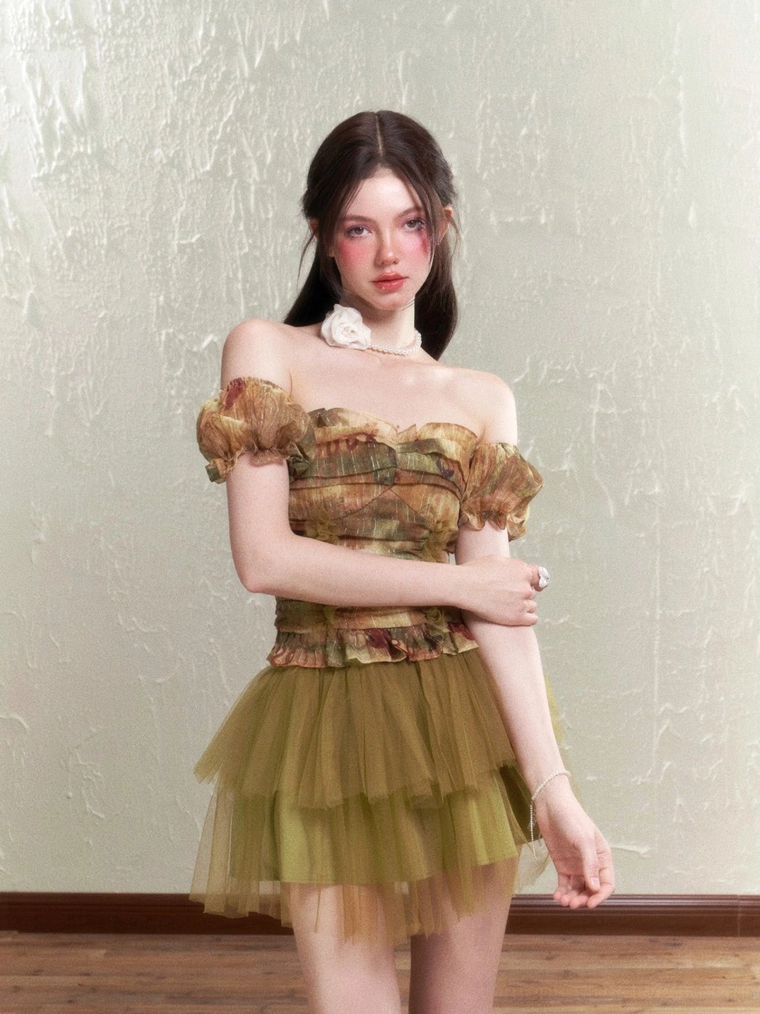 Romantic rose print tulle two-piece set with fitted corset top and playful layered mini skirt