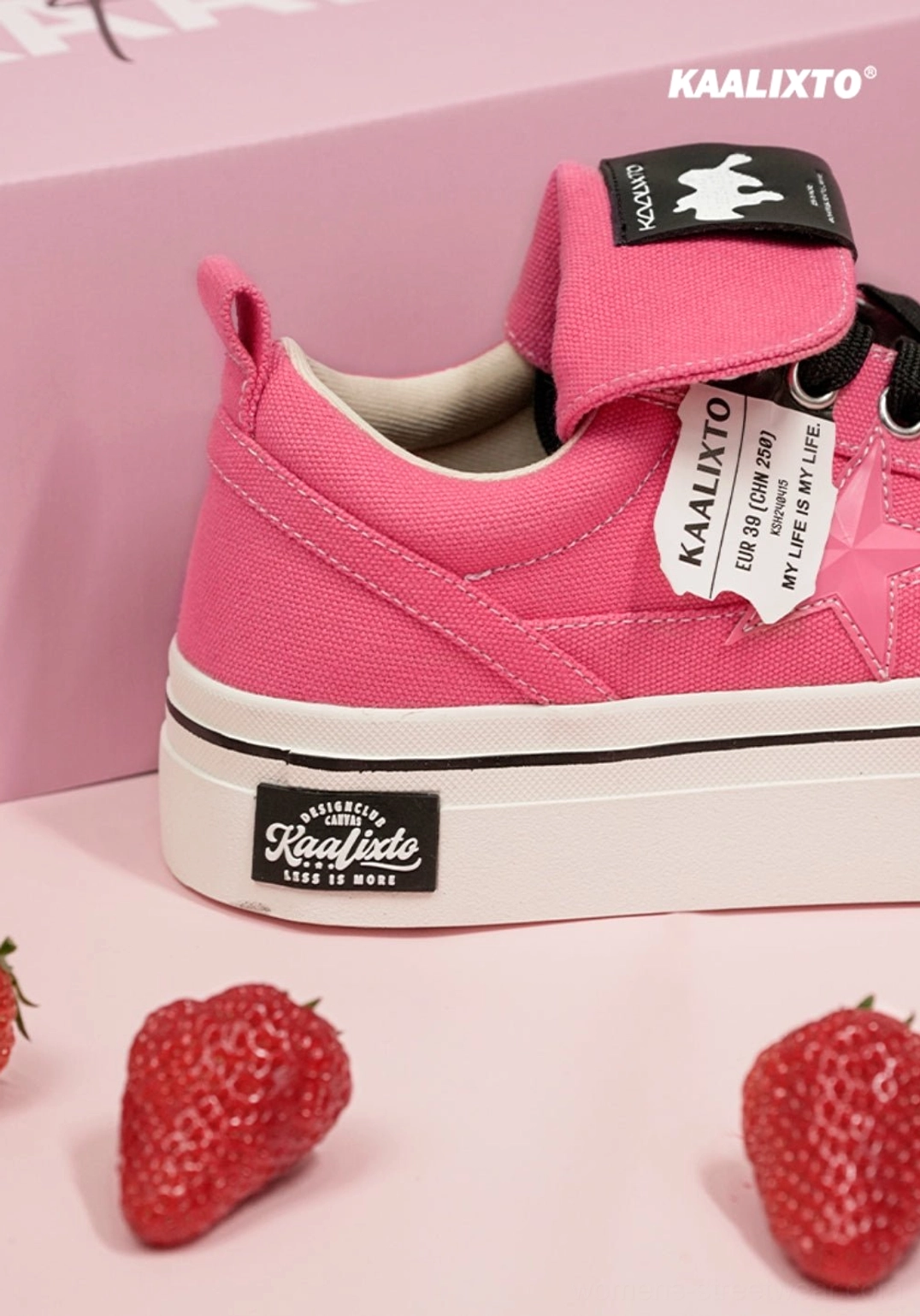 Rose pink low-top canvas sneakers with star side panel and thick white outsole styled as colorful Korean streetwear footwear