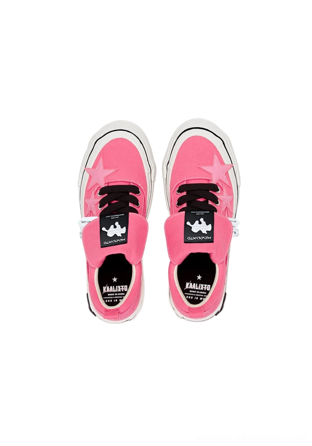 Front view of rose pink star panel canvas platform sneakers showing tongue patches lace eyelets and white rubber sole edges
