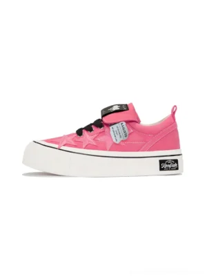 Rose pink star panel canvas platform sneaker shown in left side profile with black laces fold-over strap and thick white rubber outsole