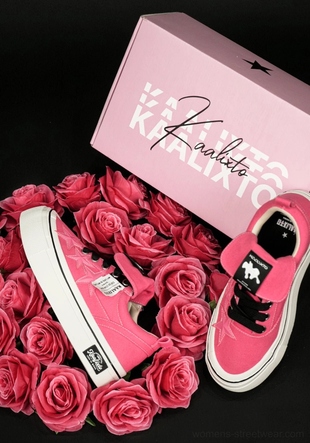 Rose pink star panel canvas sneakers displayed with a coordinated pink shoe box and red roses showing heel and inner shoe details