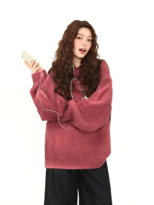 Rose red oversized fuzzy knit streetwear sweater with dropped shoulders and wide lantern sleeves styled on a female model