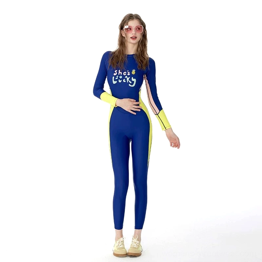 Front medium view of bodycon royal blue long sleeve swim jumpsuit with neon yellow side stripes, graphic chest print, and sporty Korean streetwear aesthetic