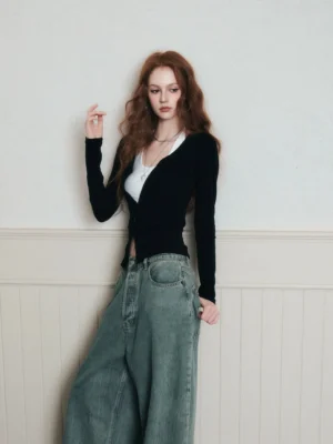 Black ruched layered knit cardigan and white halter top set shown in a three-quarter front view