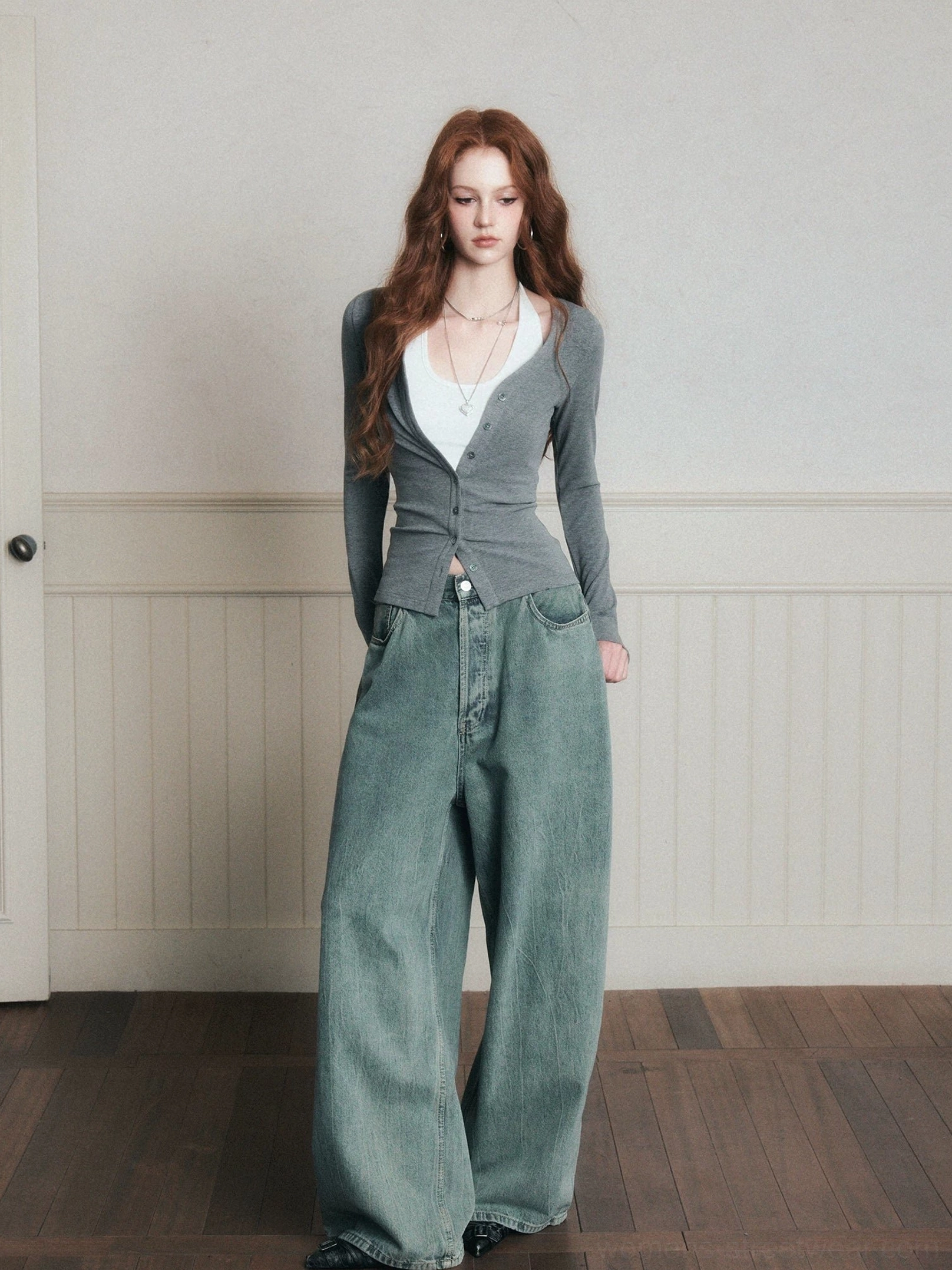 Gray ruched layered knit cardigan and white halter top set shown from the front