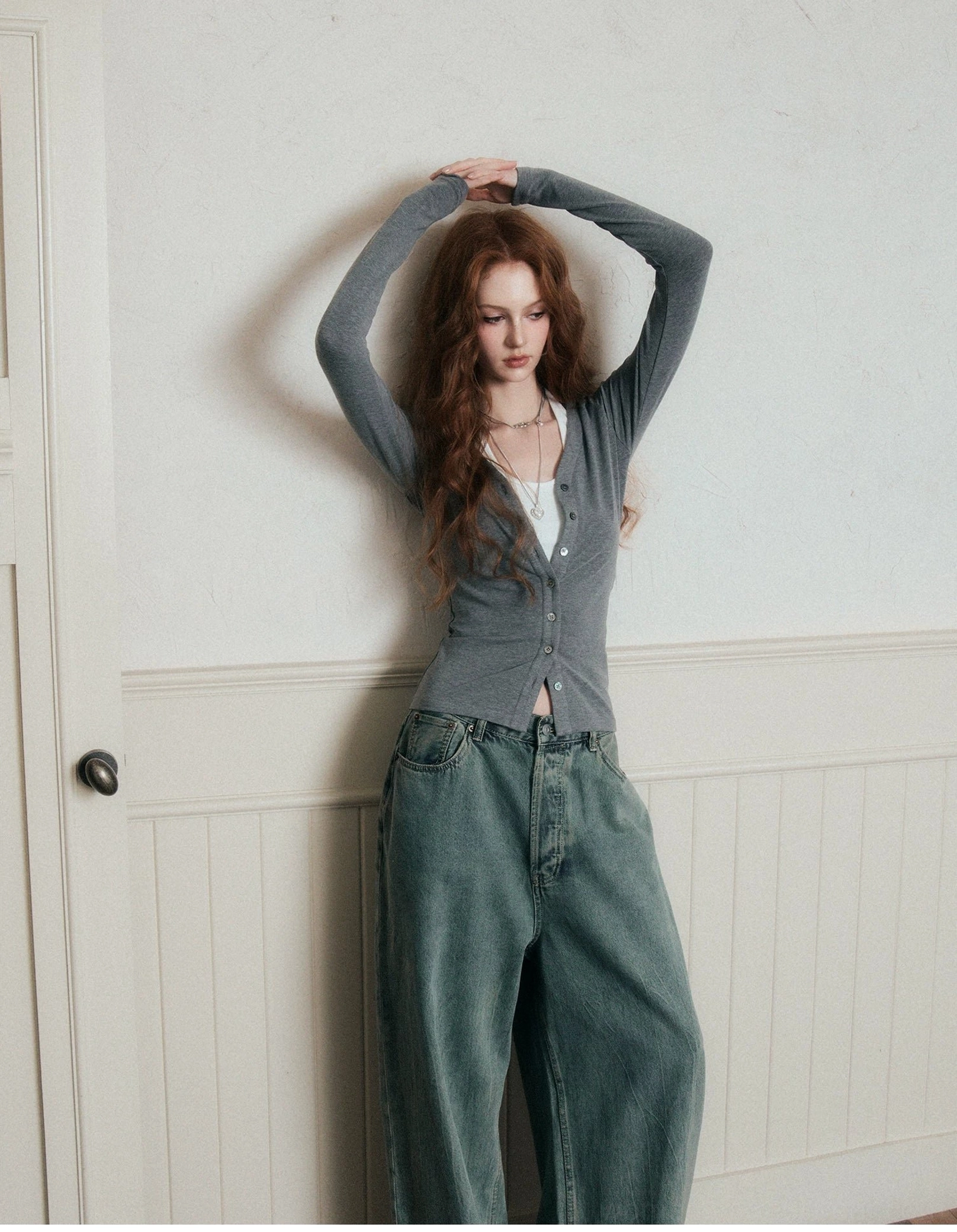 Gray button-front ruched knit cardigan and white halter top set styled with wide-leg jeans