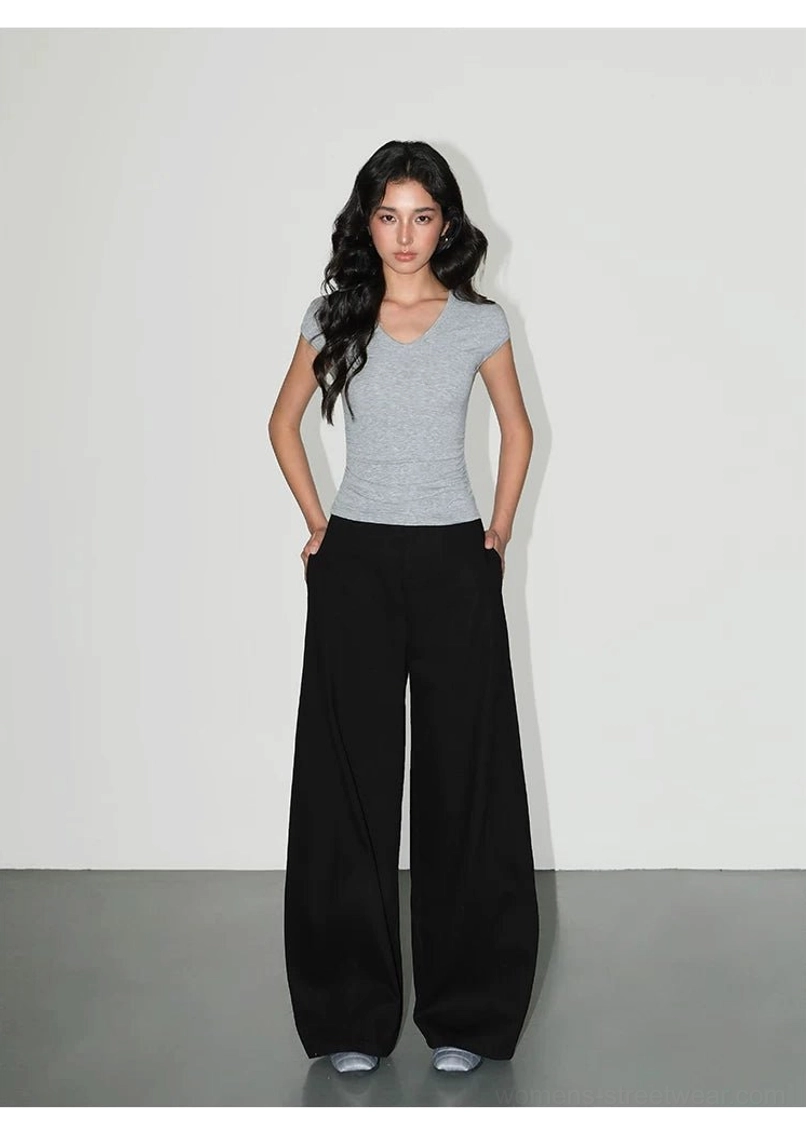 Women's ruched V-neck short-sleeve knit tee with a body-hugging silhouette and gathered waist