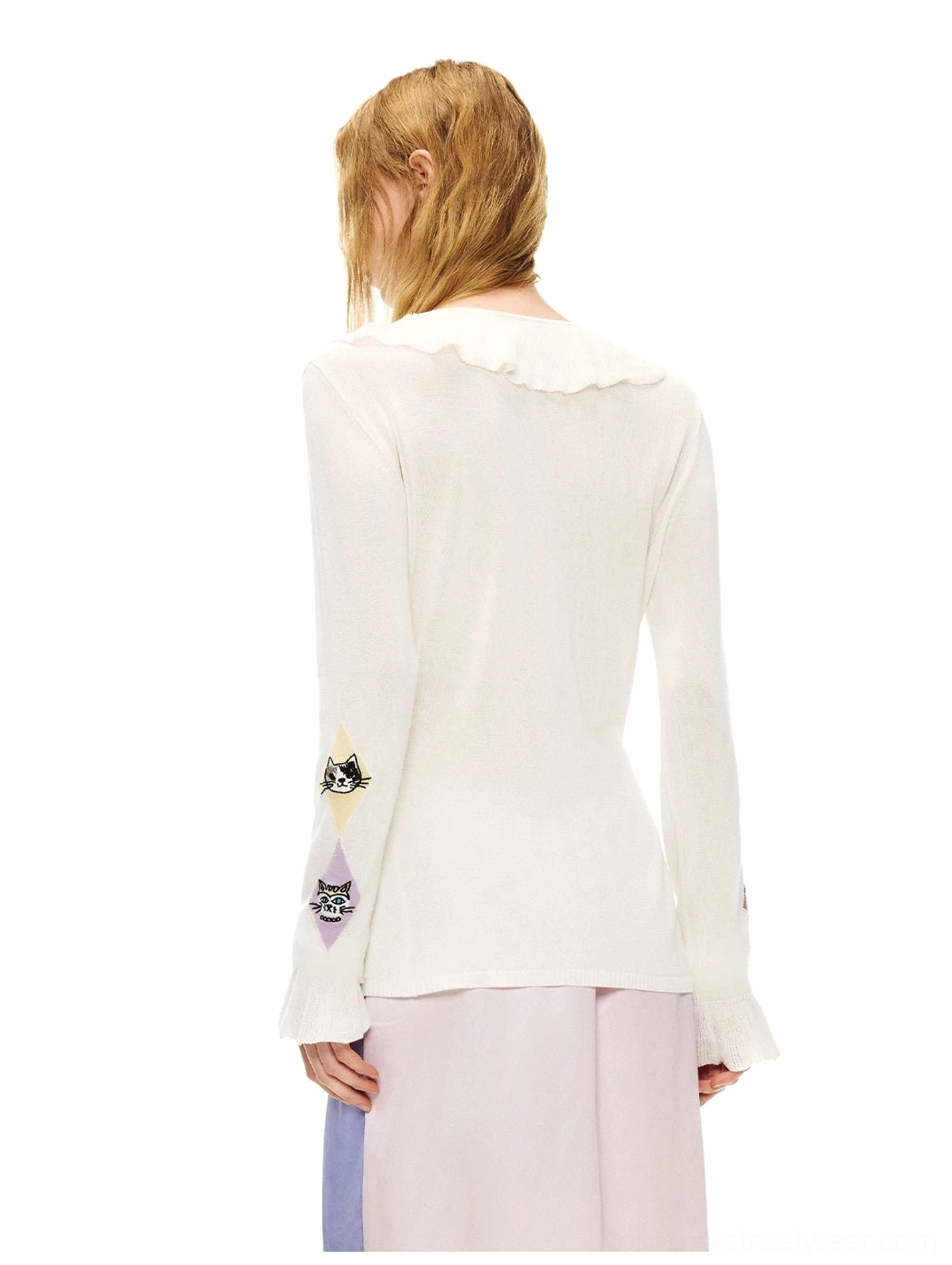 Back view of silk white ruffled kitty argyle sheer knit cardigan blouse showing the fitted back and long flared sleeves
