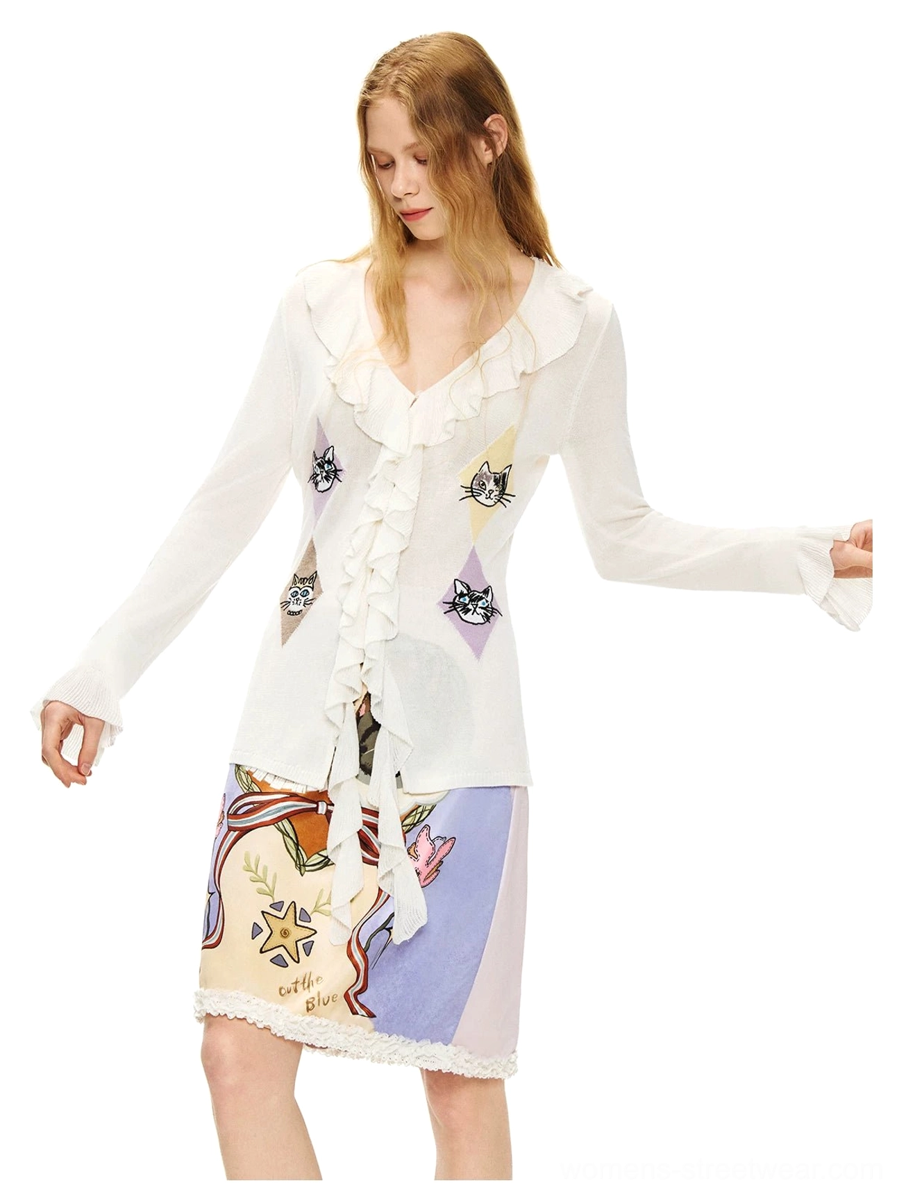 Three-quarter side view of silk white ruffled kitty argyle sheer knit cardigan blouse with a slim softly flared silhouette