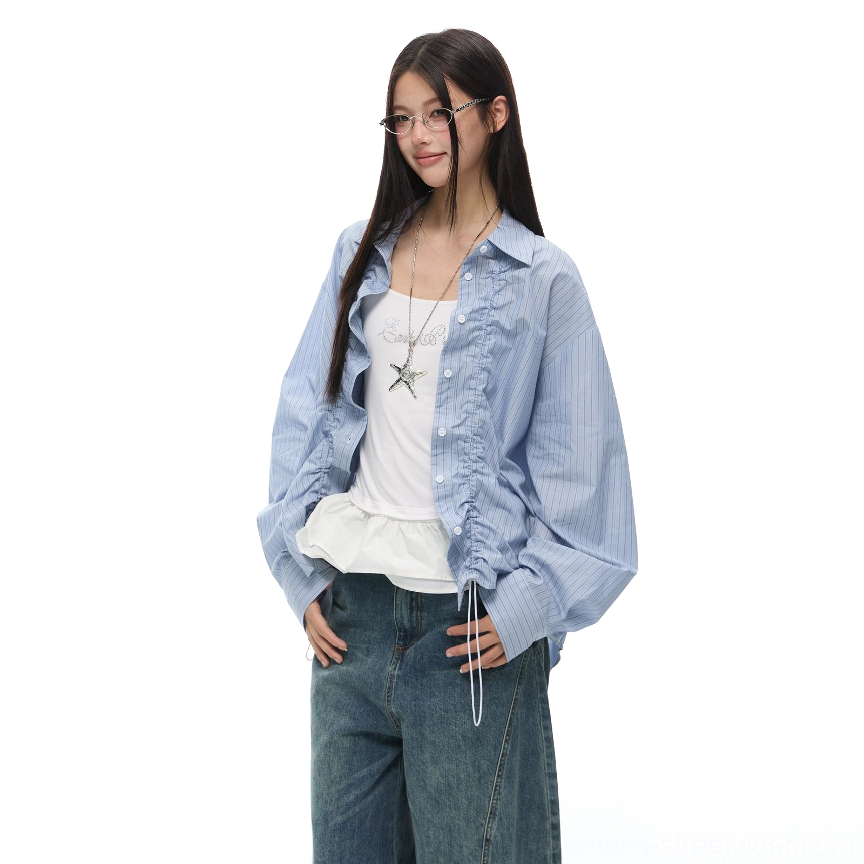 Ruffled striped oversized drawstring shirt detail showing the relaxed streetwear silhouette and feminine layered design