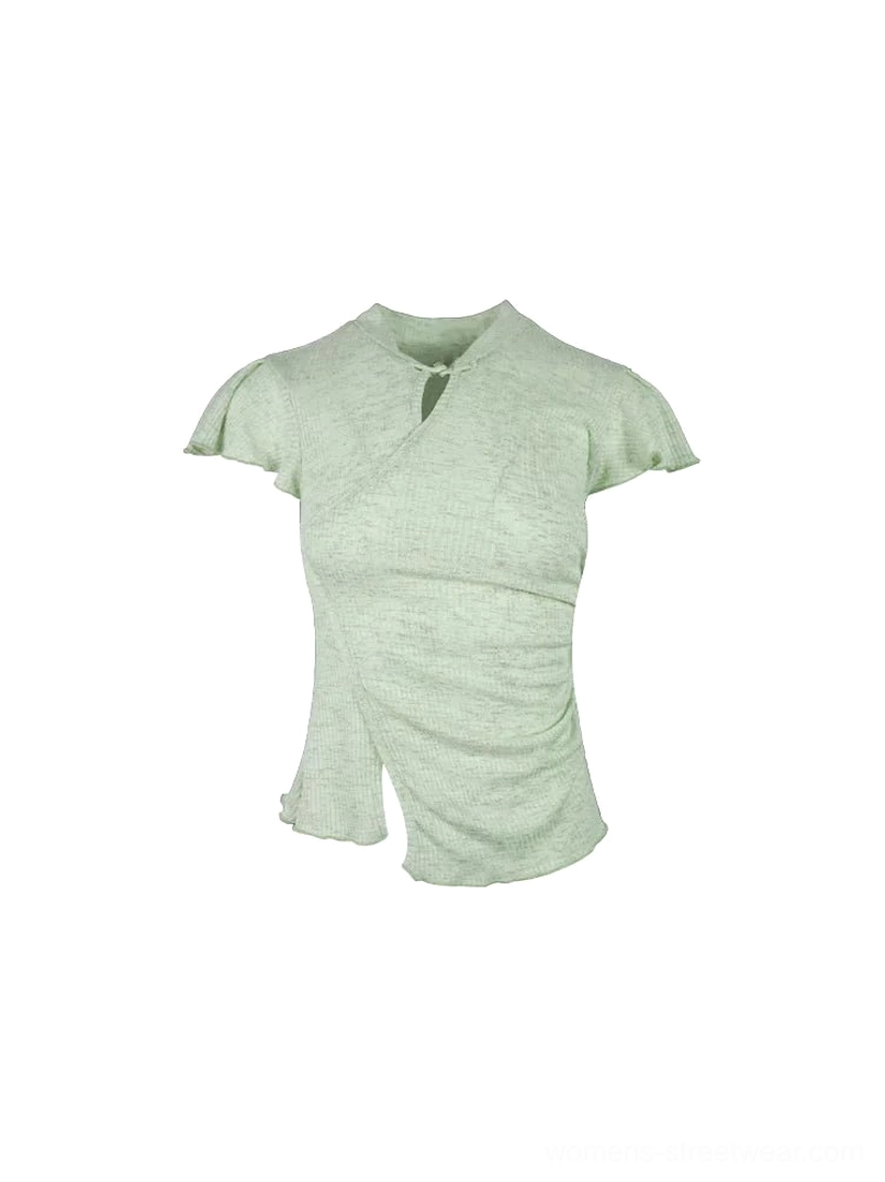 Sage green ribbed cheongsam-inspired top shown from the front with stand collar keyhole detail ruffled sleeves ruched side and asymmetric hem