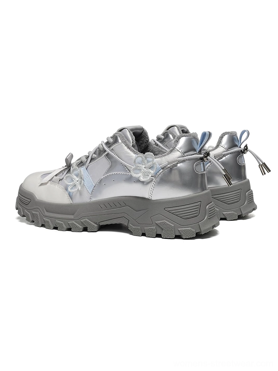 Grey sakura chunky trail sneakers shown from the rear side with matte silver grey upper dark lug sole floral lace accents and plush lining