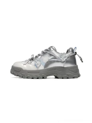 Silver sakura plush chunky trail sneaker in side three quarter view with metallic upper floral lace accents reflective panels rugged lug sole and rear pull tab