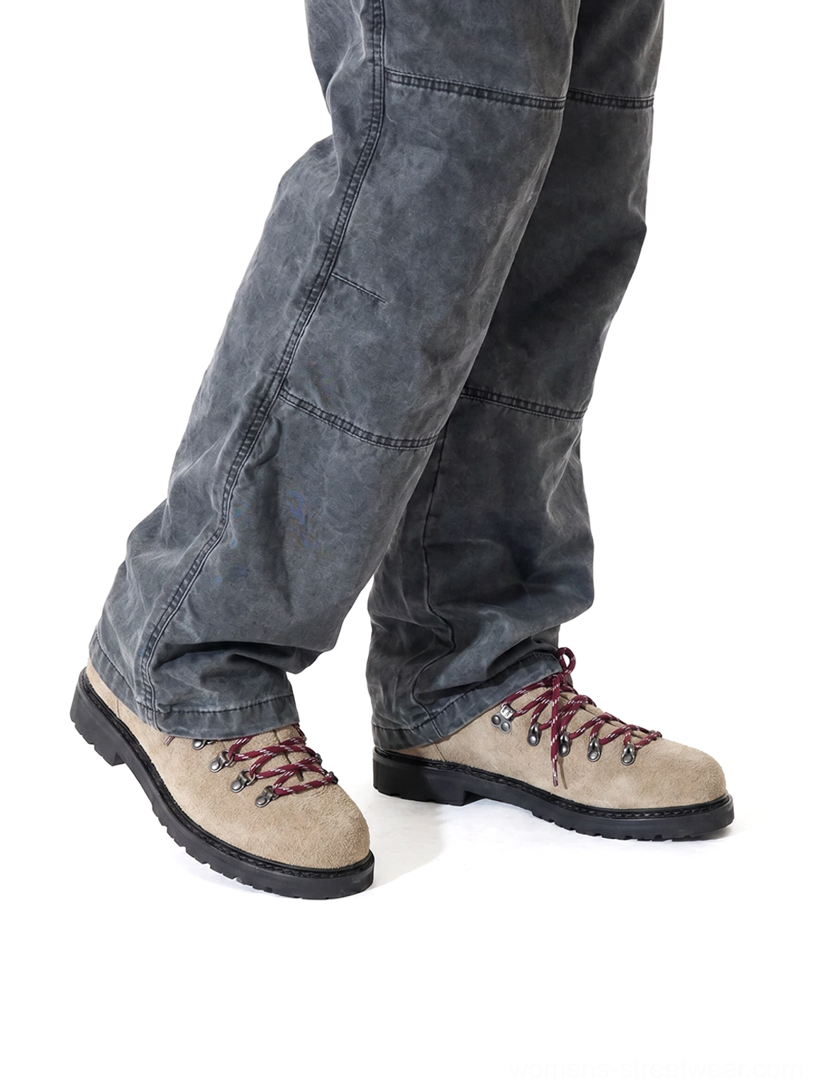 Low-angle front view of sand suede hiking derby shoes with rounded toes and black rubber outsoles