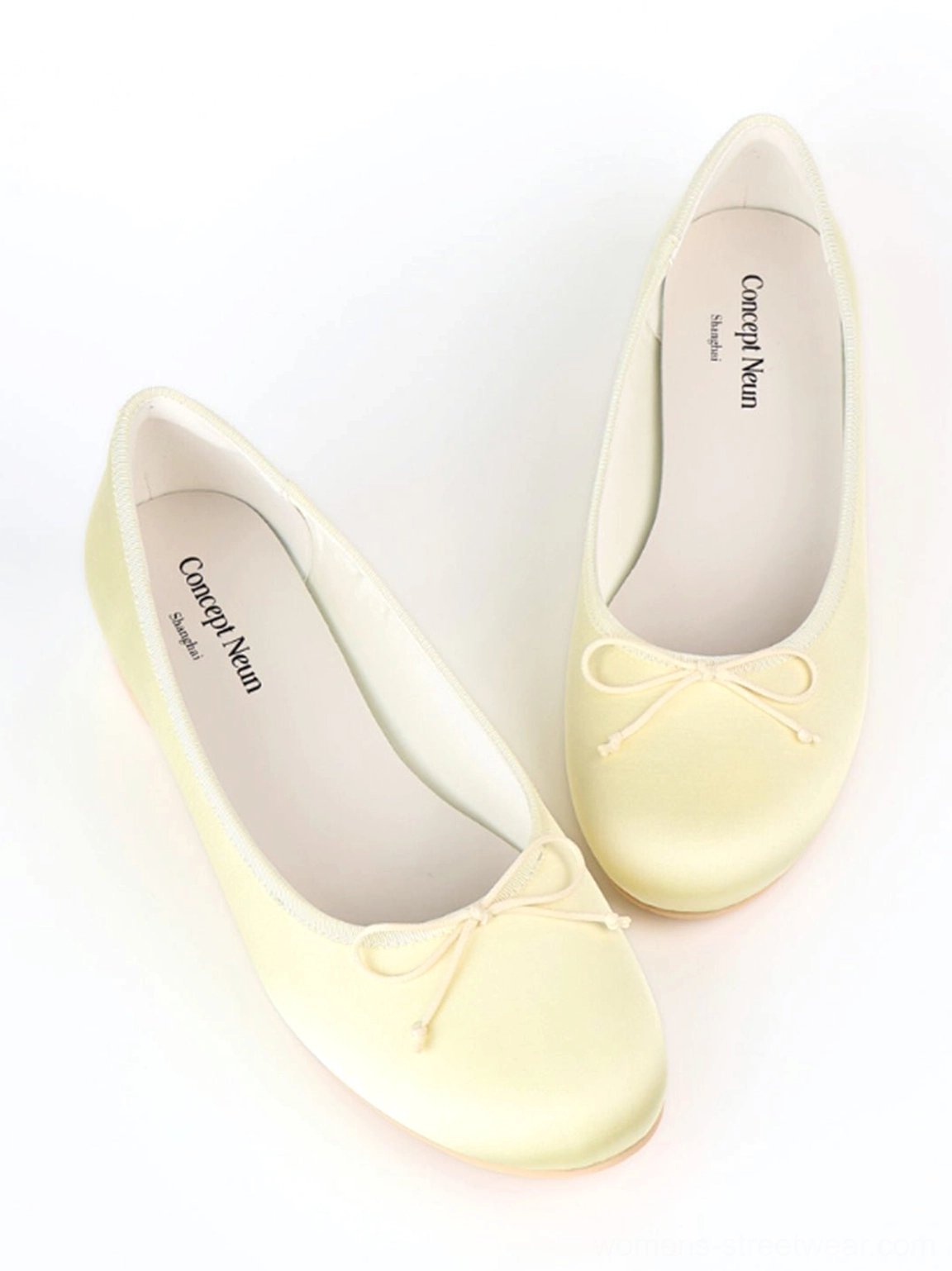 Low heel satin ballet pumps with petite toe bow and contrast piping product detail view