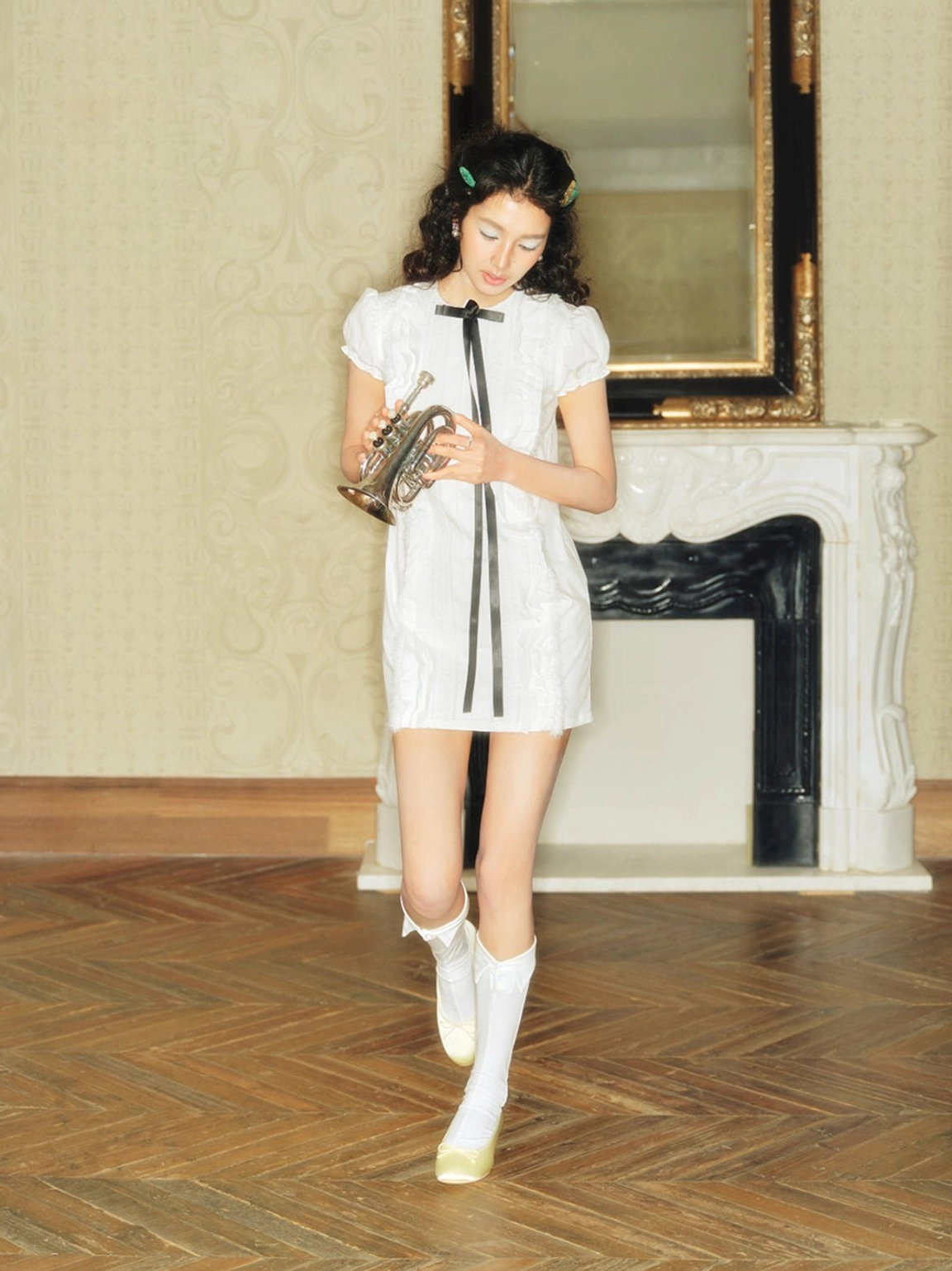 Satin bow low block heel ballet pumps styled as romantic feminine streetwear footwear