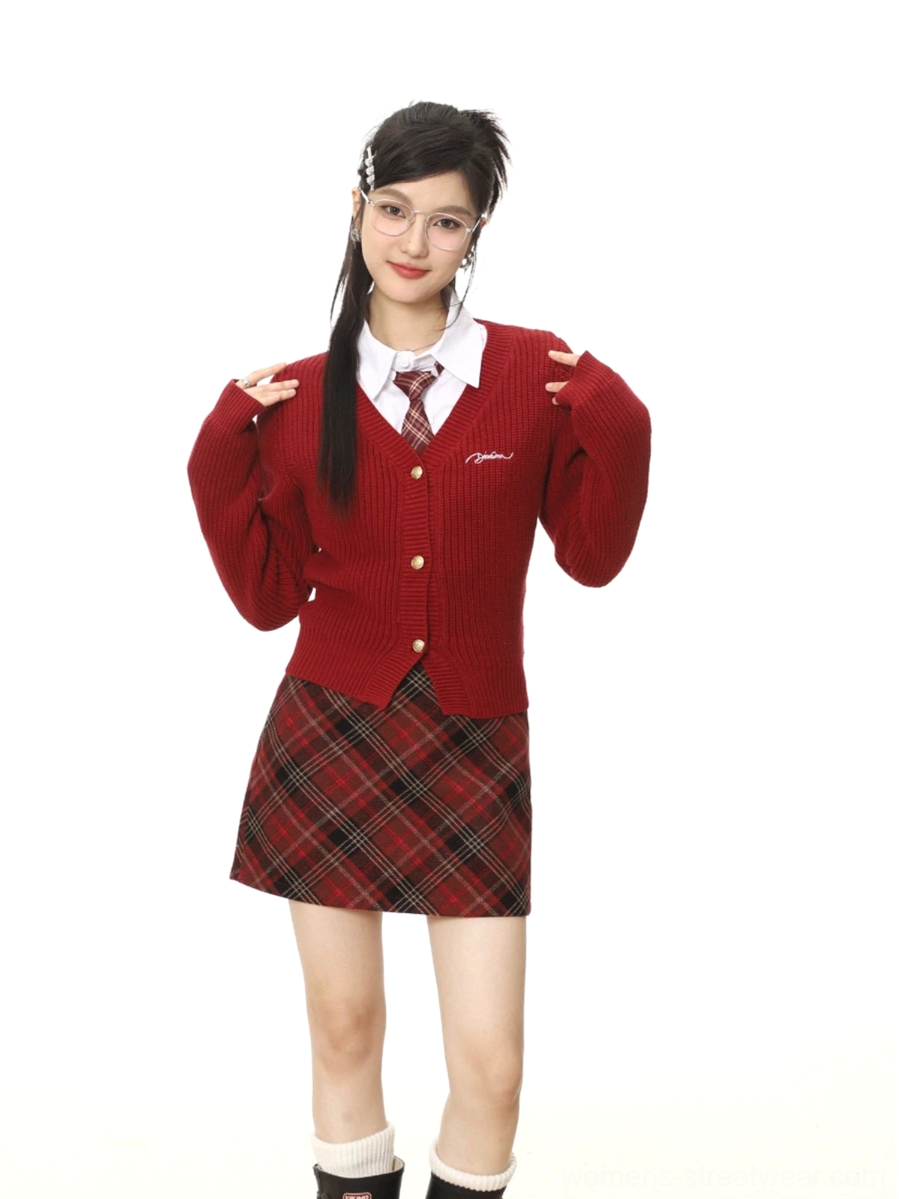 Asian model wearing a scotch red tartan plaid mini skirt with cropped red knit cardigan in a Seoul preppy streetwear outfit