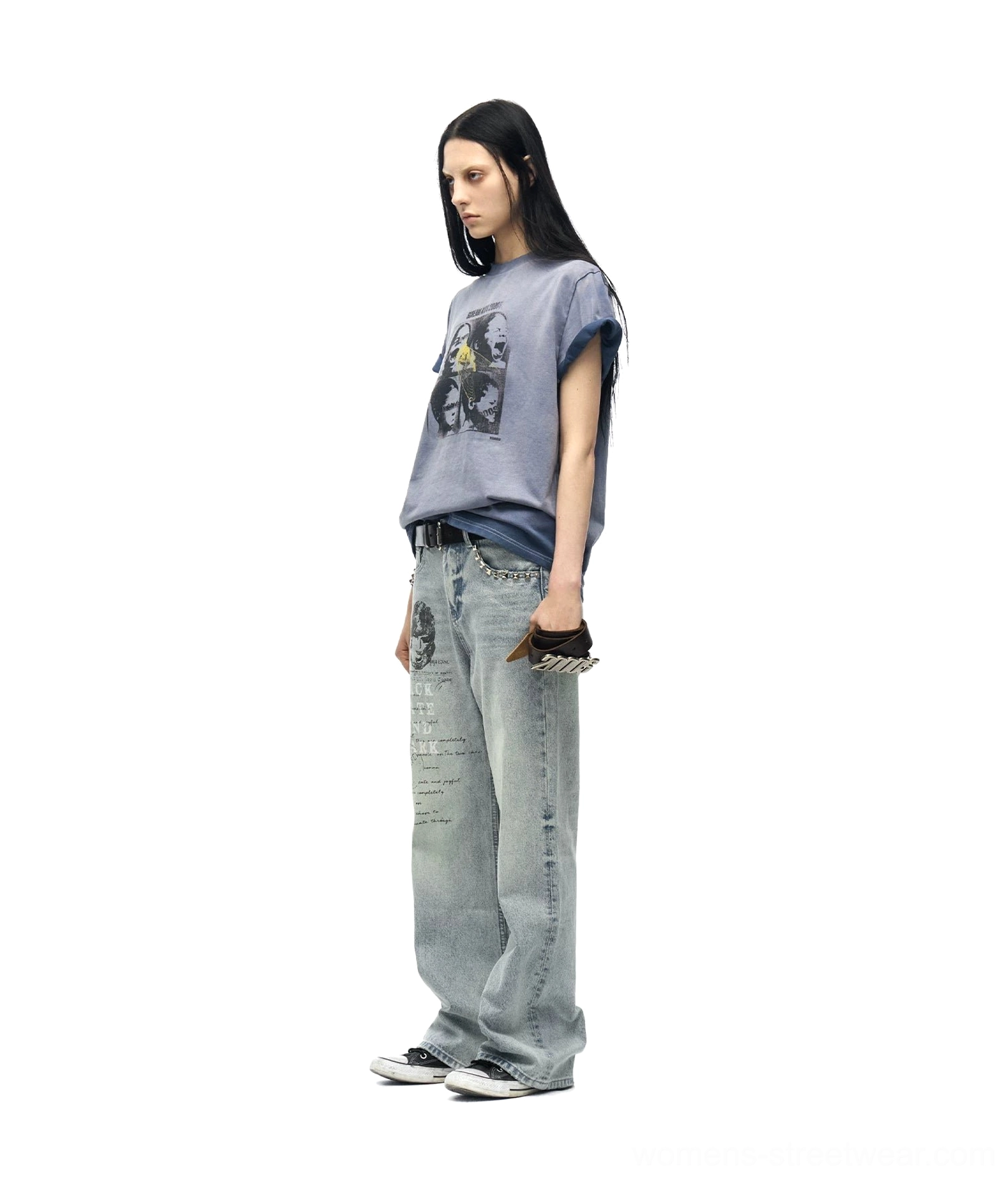 Side view of a female model wearing a slim dusty blue Scream Kids graphic T-shirt with loose light wash jeans