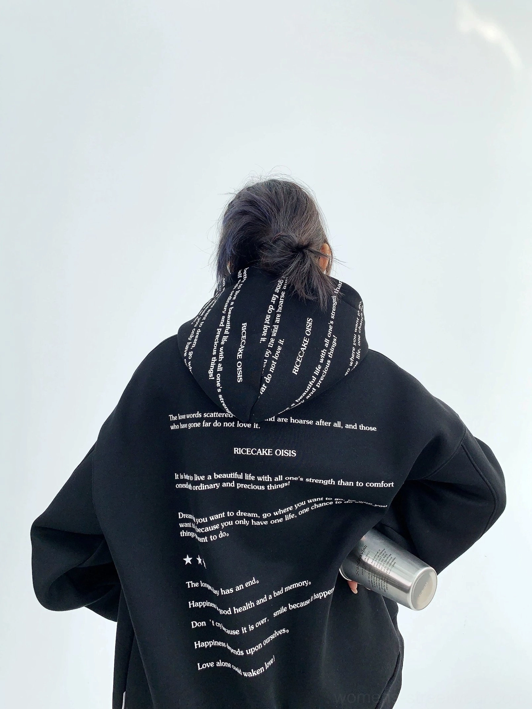 Black script print oversized drop shoulder fleece hoodie back view with white typography graphic on hood and body