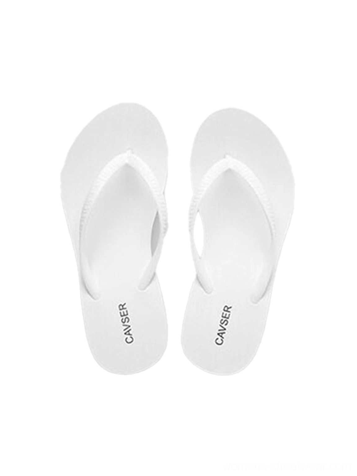 Women’s sculpted high-wedge flip-flops with toe-post straps and a bold curved platform