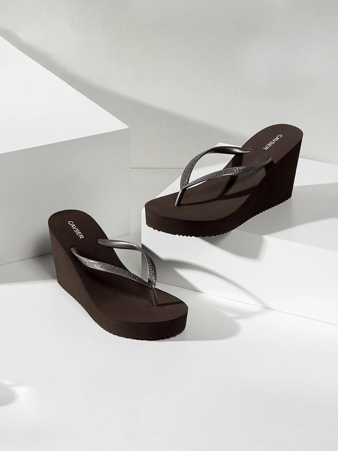 Sculpted high-wedge flip-flops designed for Y2K streetwear and vacation-ready styling