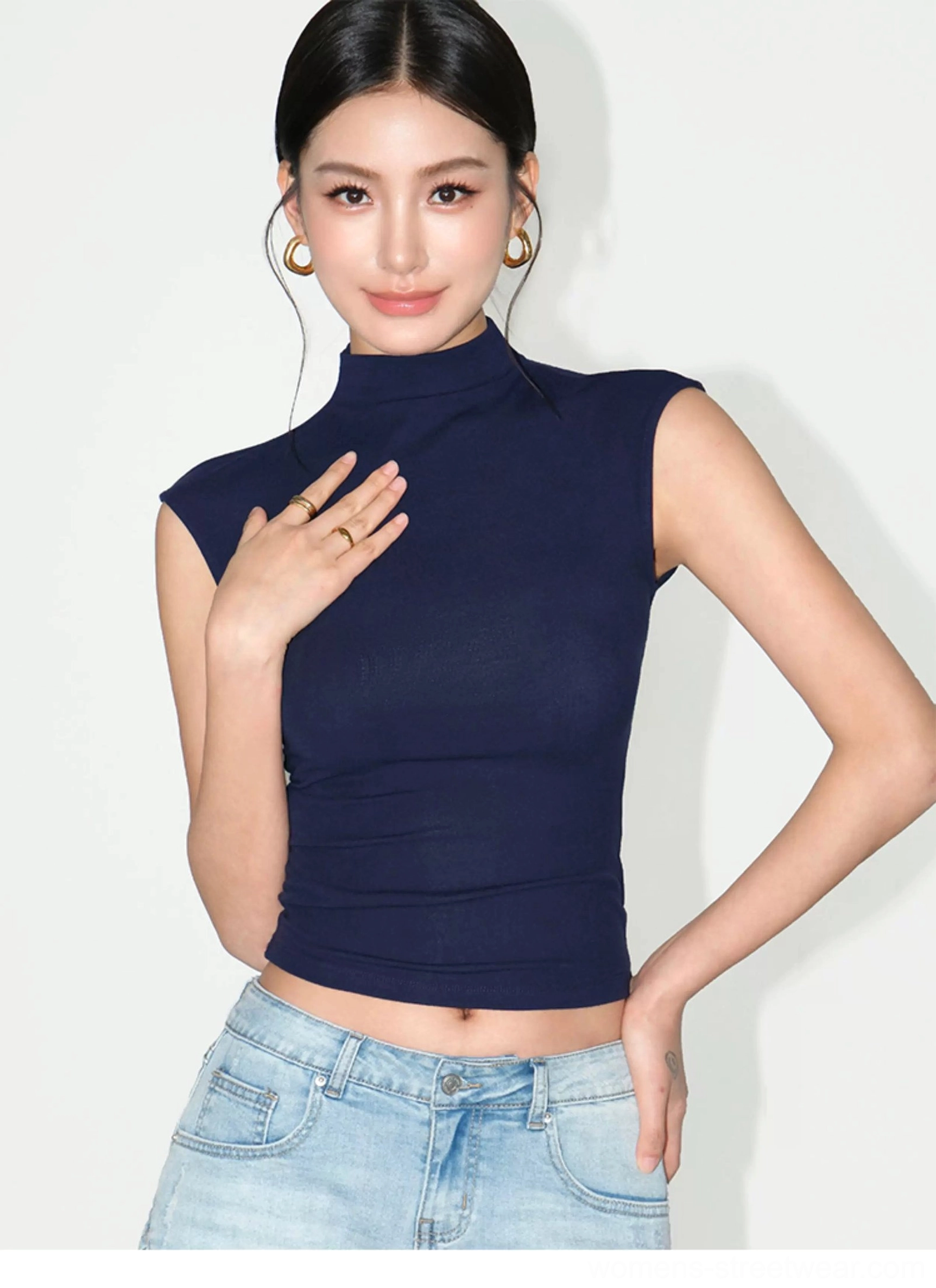 Royal blue slim fit sleeveless mock neck rib knit top front detail in minimalist studio