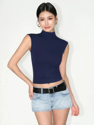 Royal blue sleeveless mock neck cropped knit top three quarter front view in Seoul inspired streetwear outfit