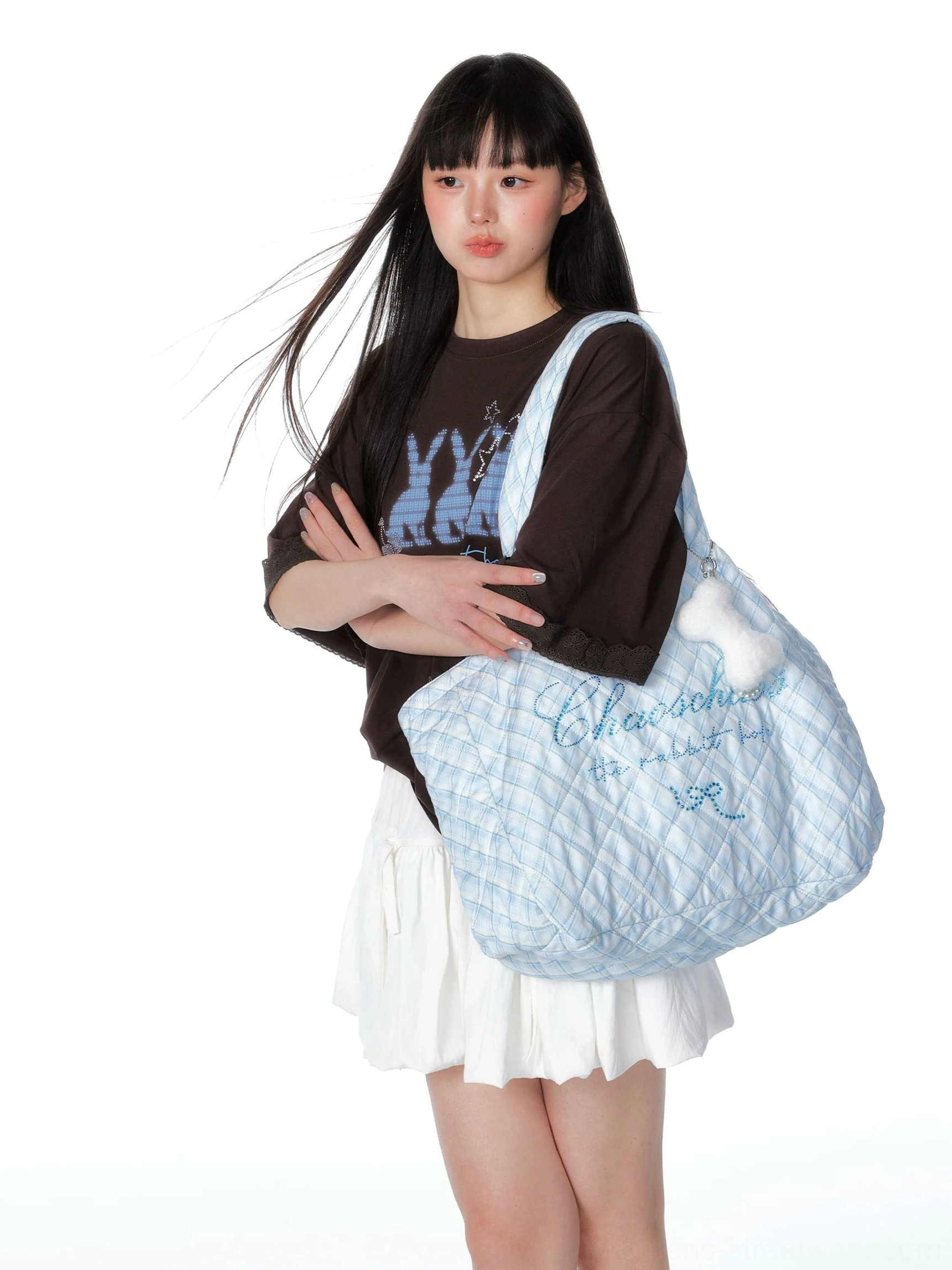 Sea salt blue quilted oversized tote bag with plaid texture rhinestone bow and fluffy charm worn on the shoulder