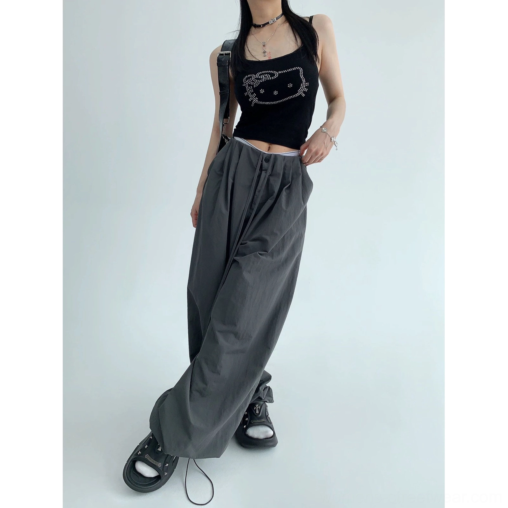 Seoul-inspired oversized parachute streetwear pants with pleated waist, side pockets, and floor-grazing wide legs