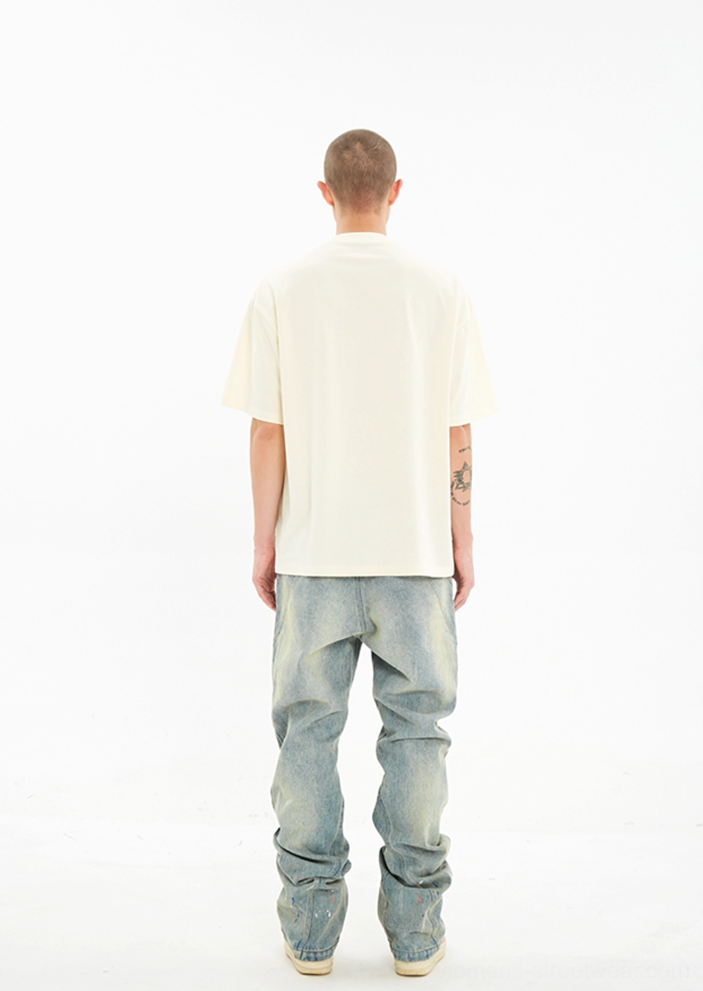 Off white Serene Dove oversized short sleeve streetwear T-shirt shown from the back on male model