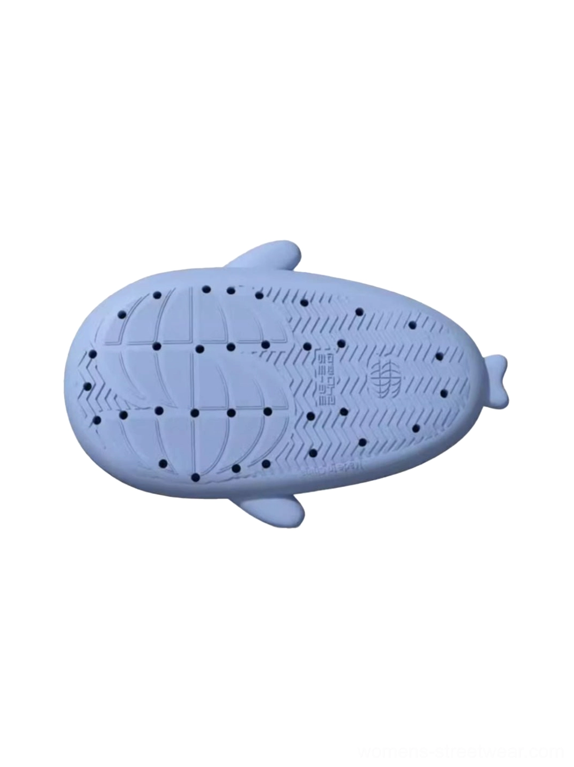 Bottom outsole view of light blue shark platform slide with textured anti-slip grooves, drainage holes, and shark tail heel