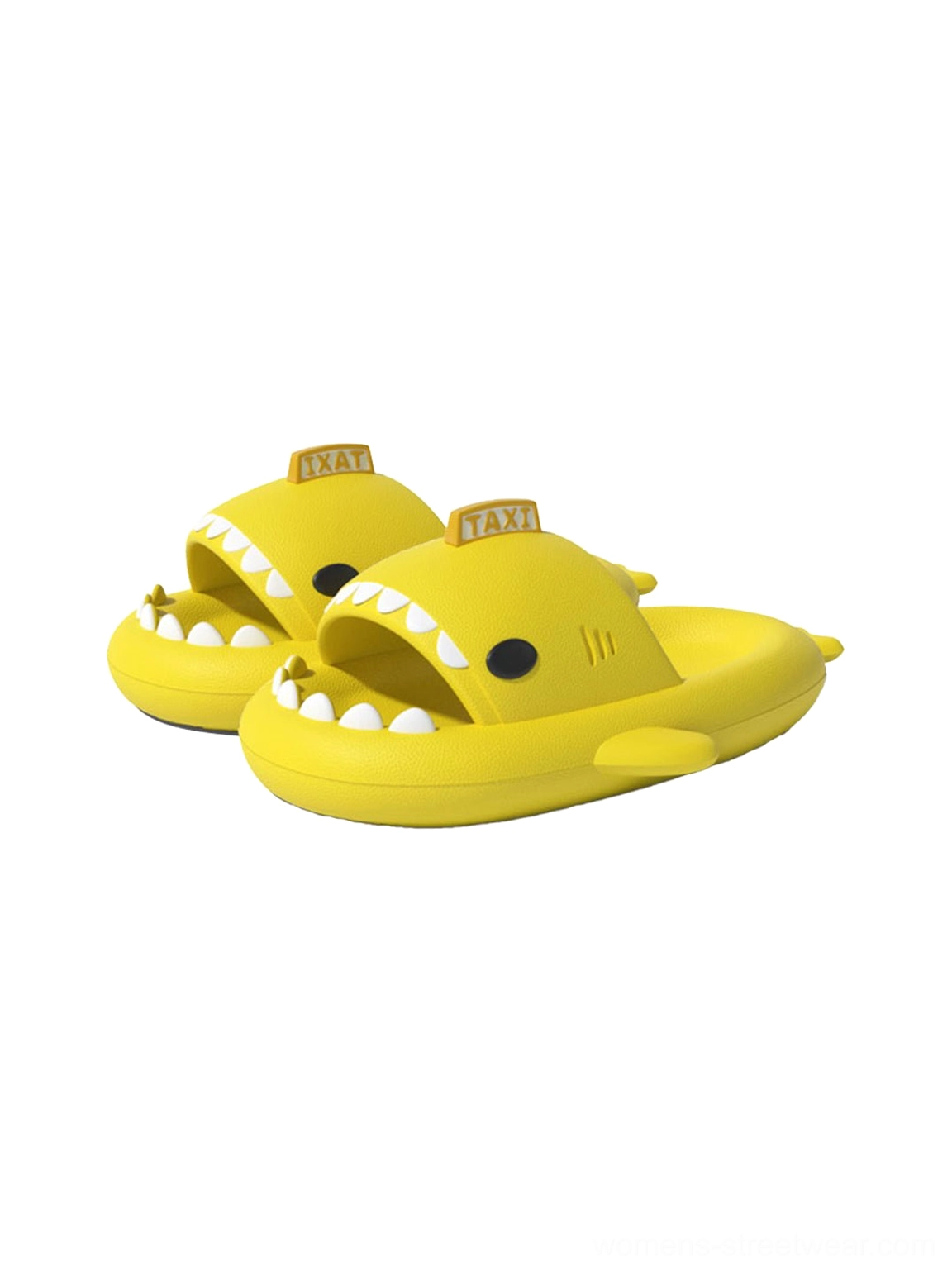 Bright yellow shark platform slides with taxi sign 3D charms, molded shark teeth, and thick platform soles
