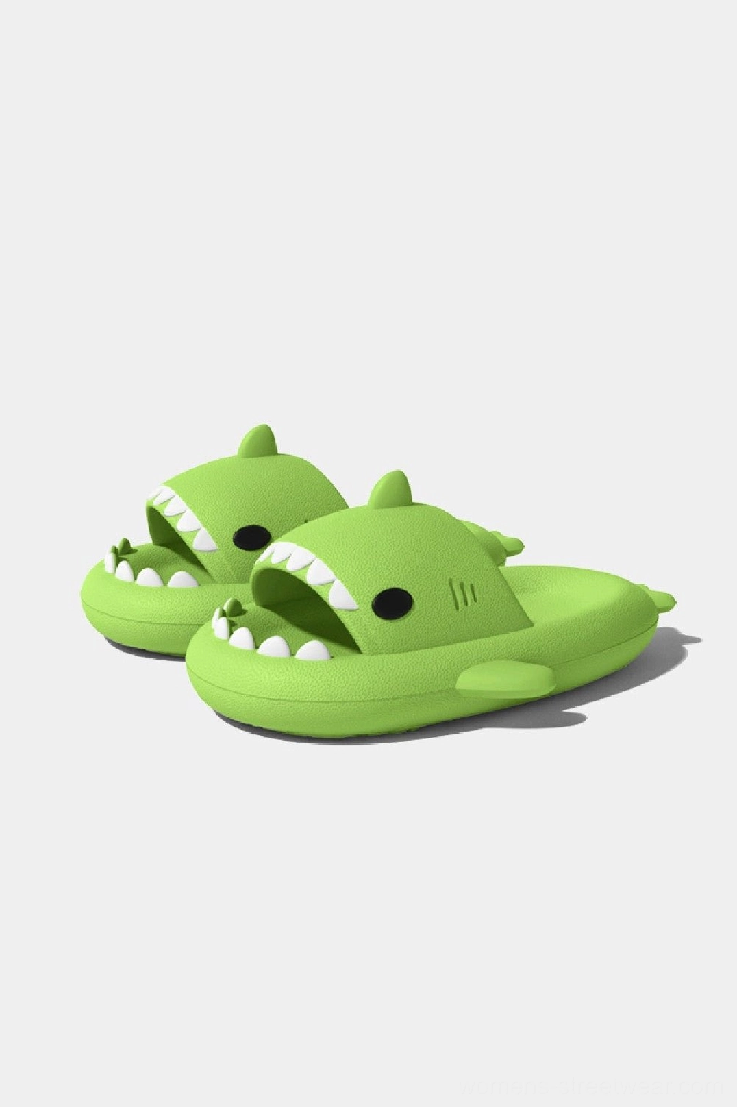 Shark slide slippers with cartoon-inspired shark details, thick lightweight sole, and expressive casual streetwear aesthetic