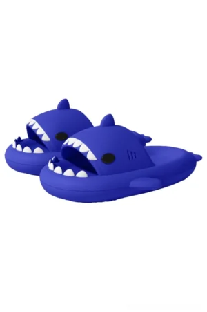 Royal blue shark slide slippers with cartoon shark mouth, teeth, fin details, thick EVA sole, and smooth matte finish