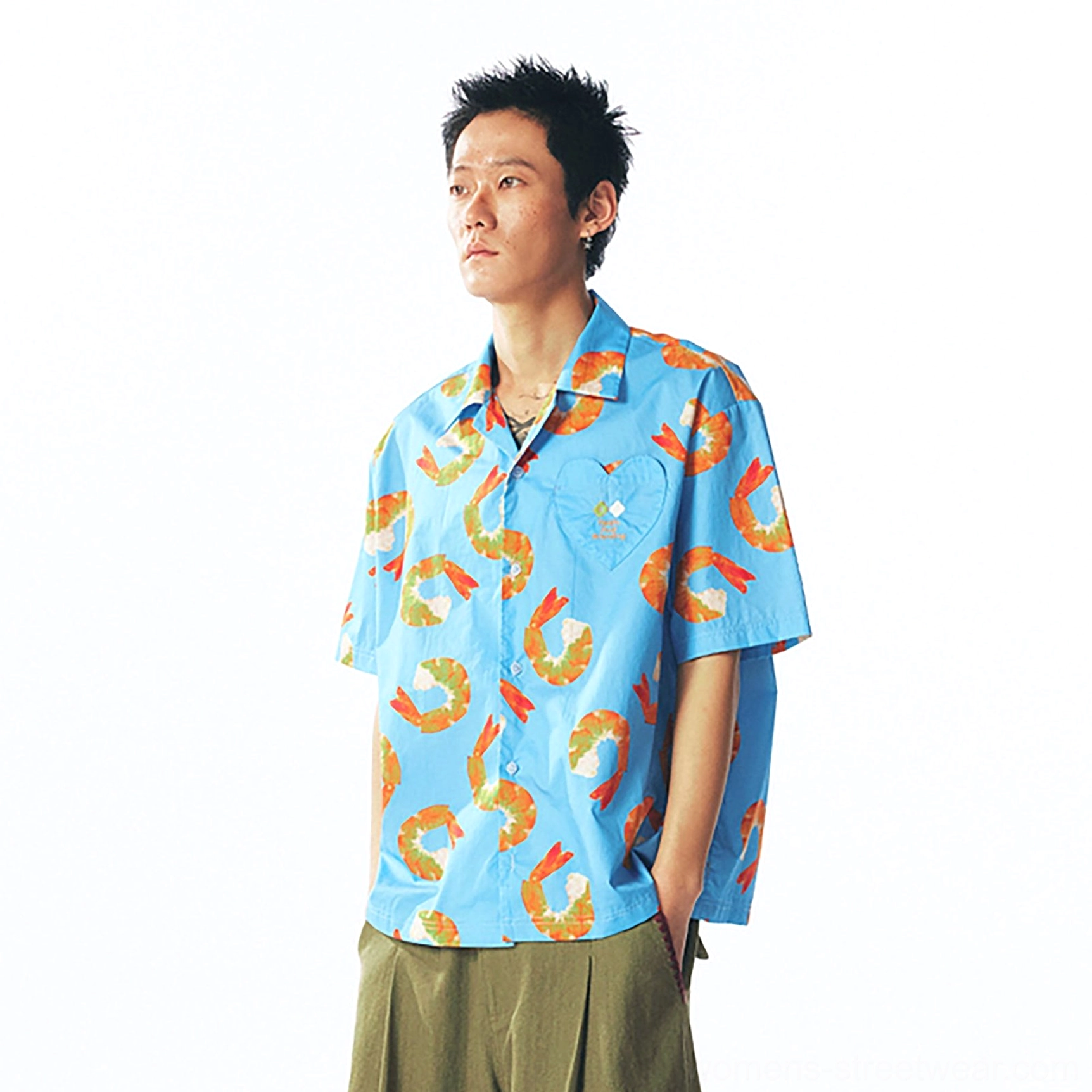 Three-quarter front view of shrimp print streetwear shirt showing button placket, chest pocket, and vibrant graphic pattern