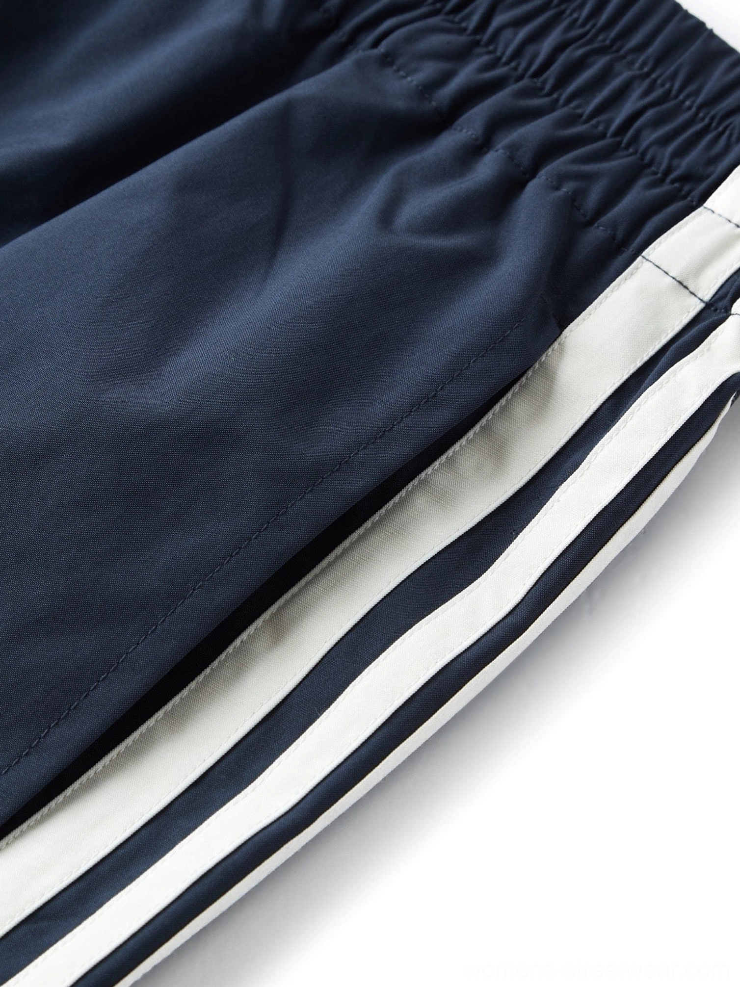 Relaxed streetwear pants with athletic-inspired detailing for modern Asian fashion outfits