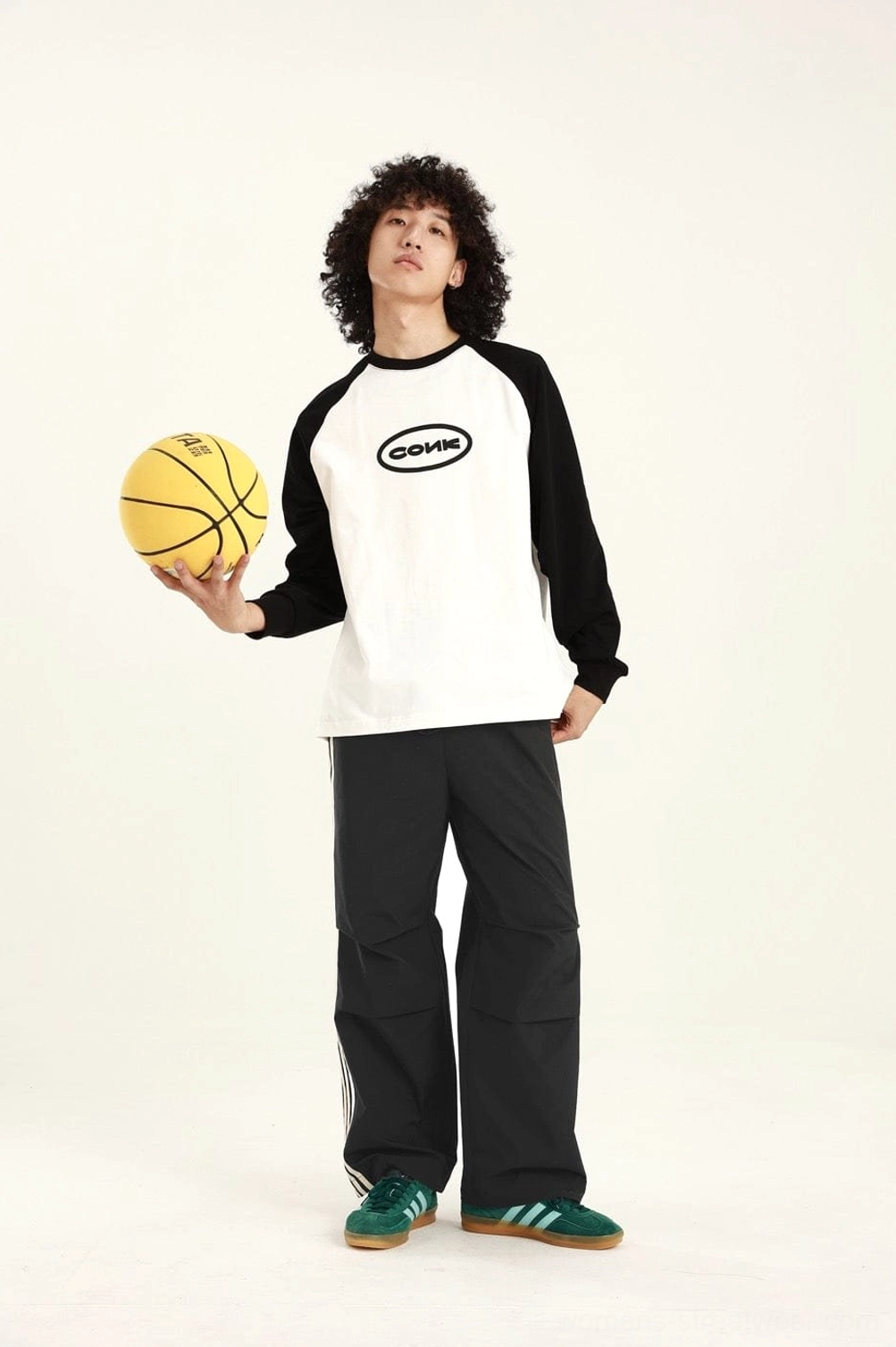 Relaxed athletic streetwear pants with utility-inspired construction and contemporary oversized proportions