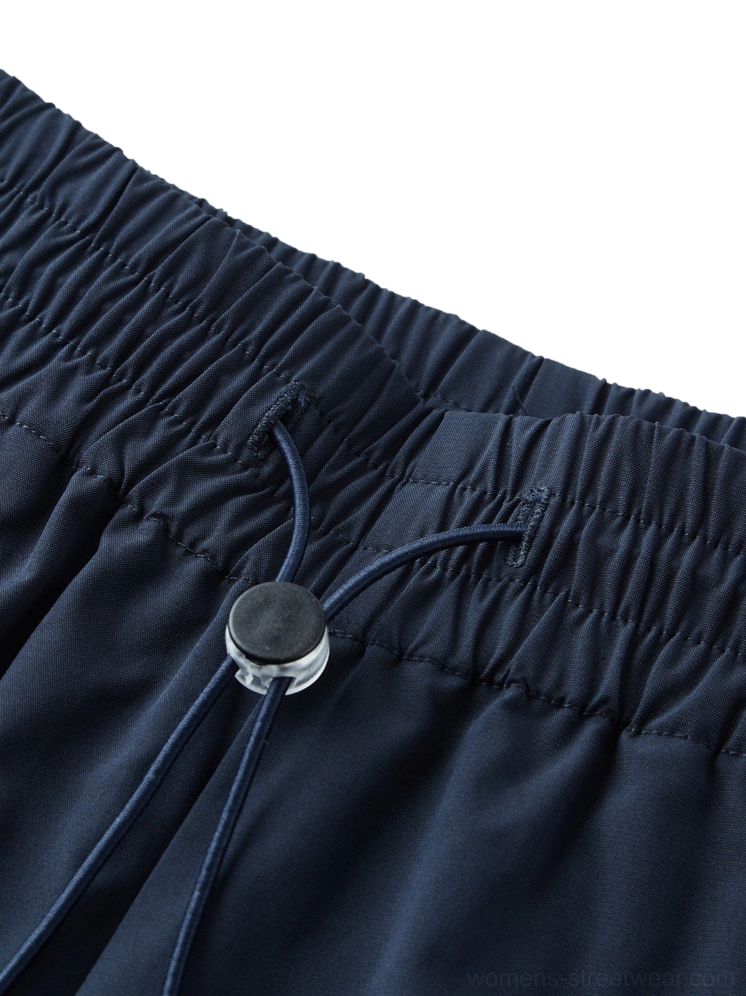 Side-stripe streetwear cargo pants styled as a contemporary Korean and Seoul-inspired fashion staple
