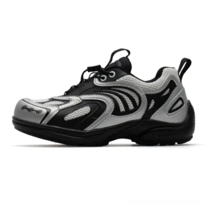 Silver black techwear mesh runner sneakers with metallic overlays bungee laces chunky rubber sole and heel pull tab on white background