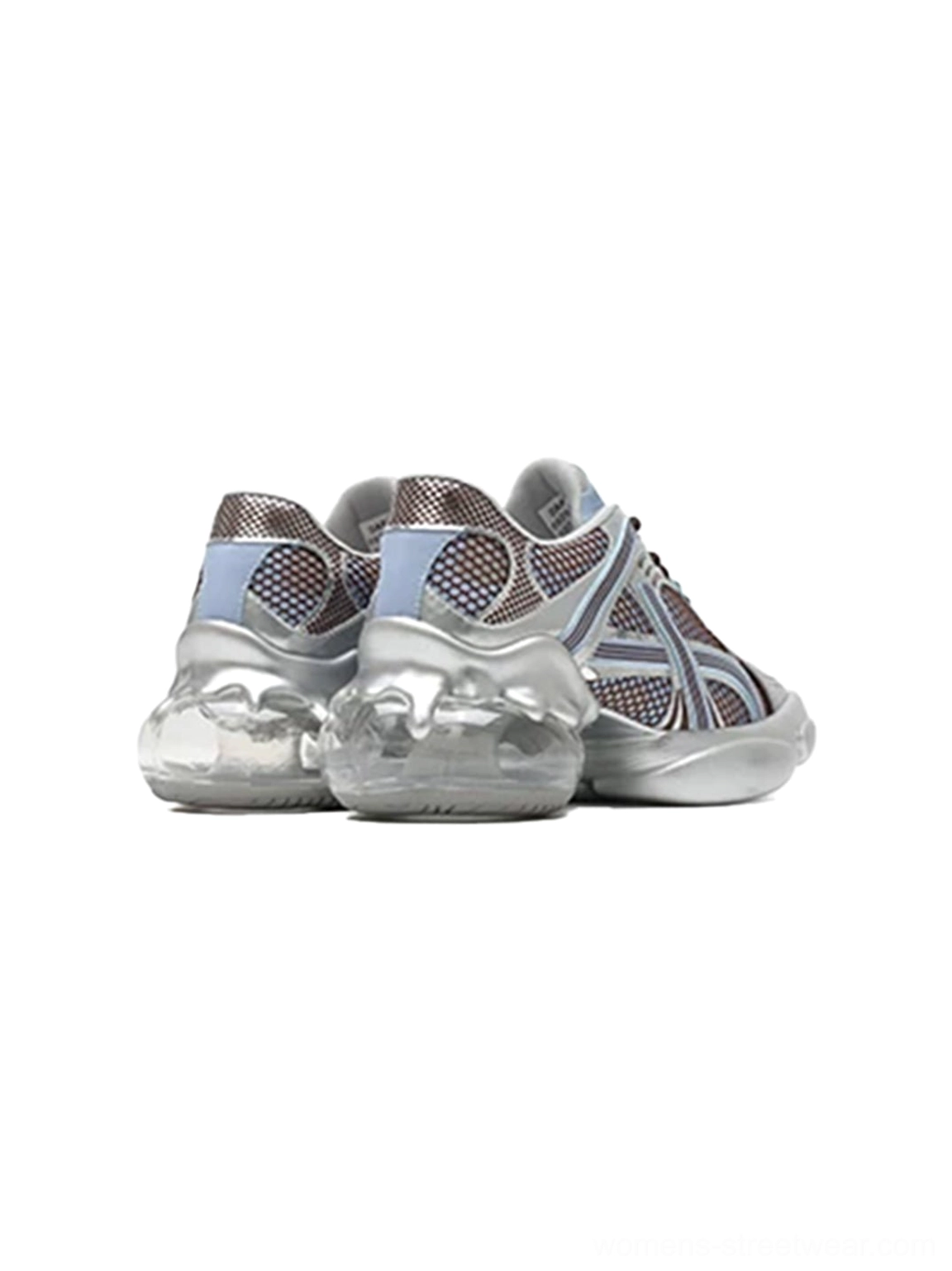 Rear side view of a silver-blue mesh chunky sneaker showing the metallic heel structure, stitched mesh panels, and layered runner construction